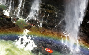 Free Swimming under the Falls for our Low Water Rafting Trips 